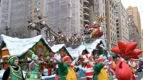 Santa's Sleigh Float w/ Santa, Miss Claus in Macy's Thanksgiving Day Parade Stock Footage 120712257
