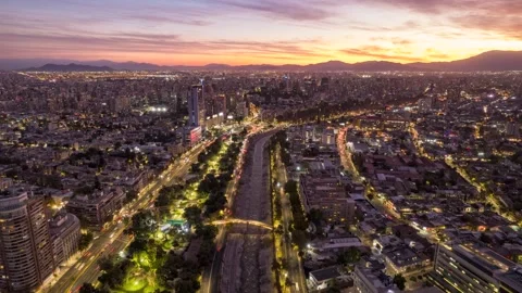 Santiago Sunset Hyperlapse: Drone Flight Over Mapocho River Westbound Stock Footage 311007004