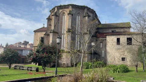 Santo Domingo medieval monastery in Tui, Galicia. Panning at day time Stock Footage 328589300