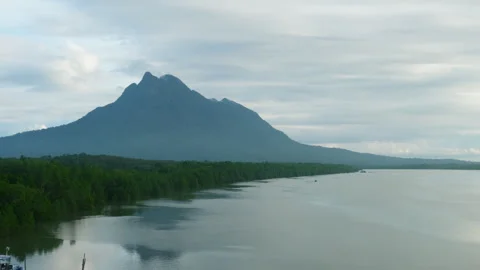Santubong and cloud tilt up Stock Footage 272431764