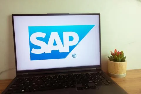 SAP software corporation logo displayed on laptop Stock Photos