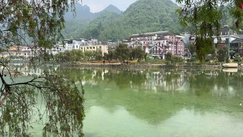 Sapa Lake Reflection with Willow Trees and Green Landscape 스톡 동영상 342536261