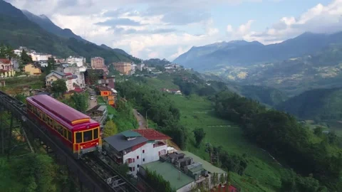 Sapa Mountain Train Close Flyover and Aerial Panoramic View of Rice Paddies Stock Footage 336486896
