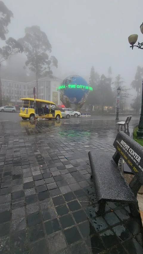 Sapa Square and World Statue in Fog – Sapa, VIETNAM – 2024/06/06 Stock Footage 319795604