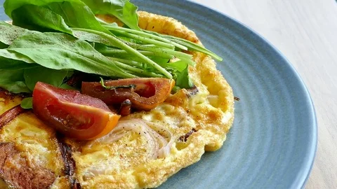 Sapnish omelette with fresh vegetable Stock Footage