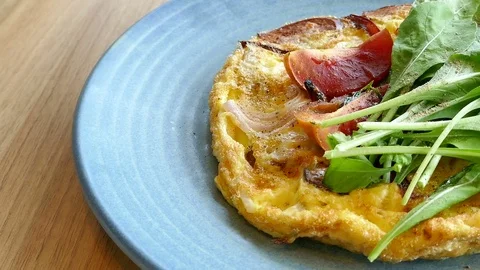Sapnish omelette with fresh vegetable Stock Footage 83926950