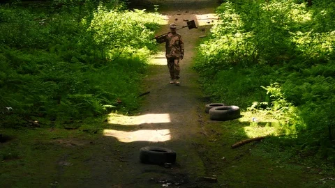 Sapper goes in jungle inside abandoned building Stock Footage 94366333