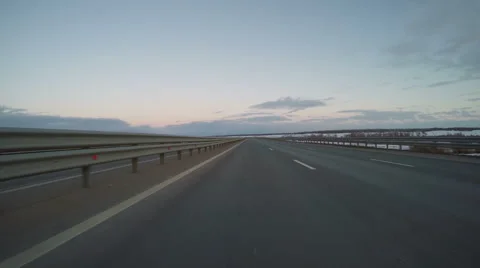 Сar driving by an empty road Stock Footage