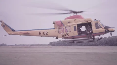 SAR rescue Helicopter touching down. Stock Footage 21892915