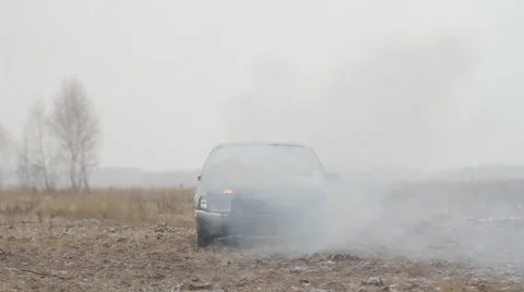Сar In The Smoke. Сar Fire. Broken Car. Front View Stock Footage 47458550