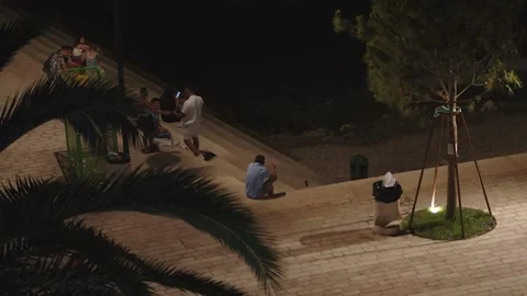 Saranda - Lonly Man on Public Beach at Night Stock Footage 171165848