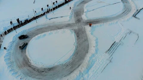 Saransk, Russia - 02/03/2019: Aerial shot of winter drift competition on Lada Stock Footage