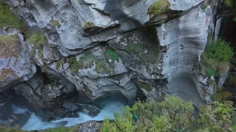 Saraswati River Flowing Through Deep Rock Gorges in Mana Village, Uttarakhand Stock Footage 334927669