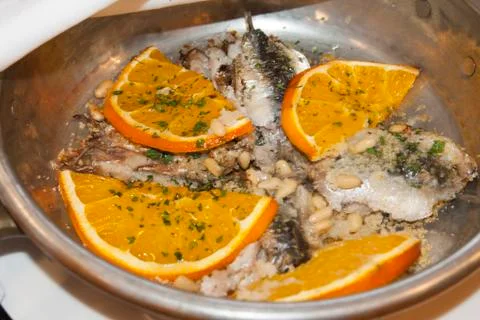 Sardine with oranges Stock Photos