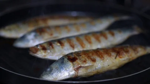 Sardines on grill Stock Footage 88798644