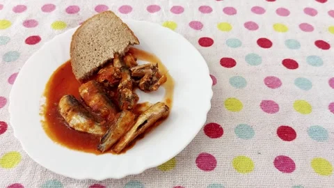 Sardines in Tomato Sauce with Rustic Bread- Quick Meal Prep Stock-Footage 316465414