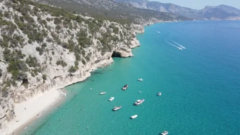 Sardinia Cliffs Beach yachts Stock Footage 294836780