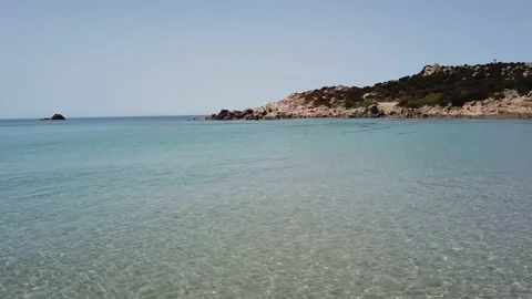 Sardinia: flight over white sand beach and turquoise sea Stock Footage