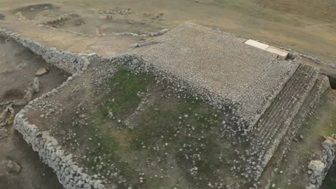 Sardinia Pyramid Epic Drone Circle Ascend, Monte d'Accoddi, Hazy Sunset, 4K Stock Footage 171303175