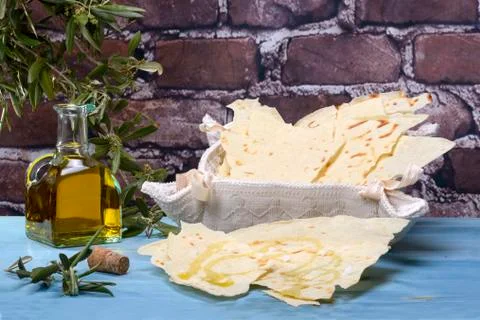 Sardinian bread "Guttiau". Stock Photos