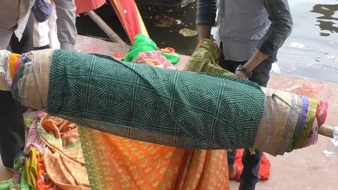 Saree on the cloth roll being shown Stock Footage 126768218