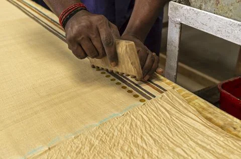 Saree printing by blocks, process by worker, India Stock Photos