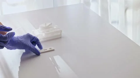 SARS-CoV-2 Antigen Rapid Test Kit, home-use test kit, step 2,3 Stock Footage 165070795
