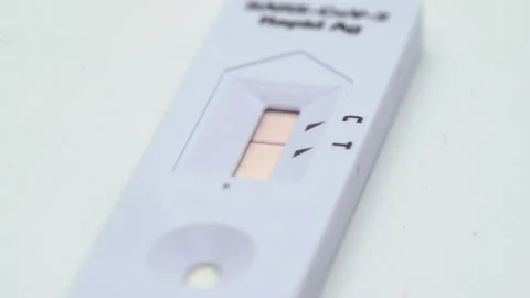SARS-Cov-2 Rapid Ag Antigen coronavirus rapid self test. Covid-19 virus testing. 動画素材 176019739