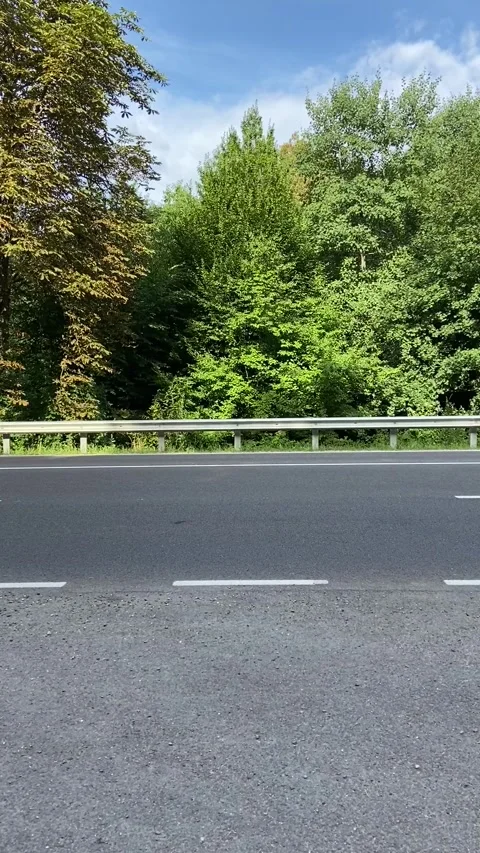 Сars pass on the road with high speed near the camera Stock-Footage 157561328