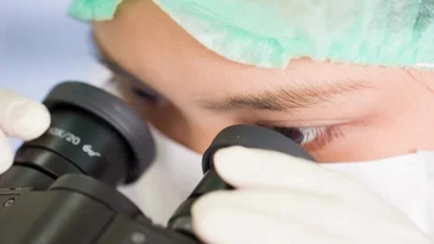 SARS virus under the microscope, in a study to understand its structure Stock Footage 336583597