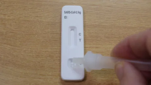 SARS‑CoV‑2 Antigen Test Positive Video stock 168183907