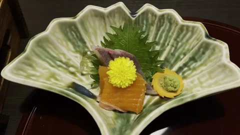 Sashimi on Leaf-Shaped Plate Stock Footage 322972748