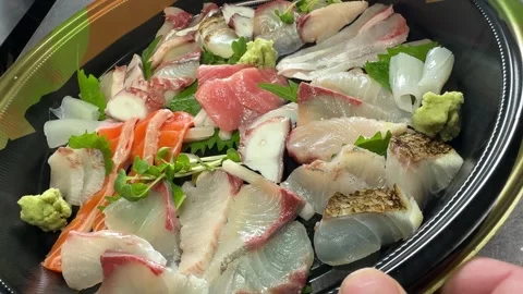 Sashimi Platter: Assorted Tuna, Sea Bream and Octopus in Takeout Box, Japan Stock Footage 343098809