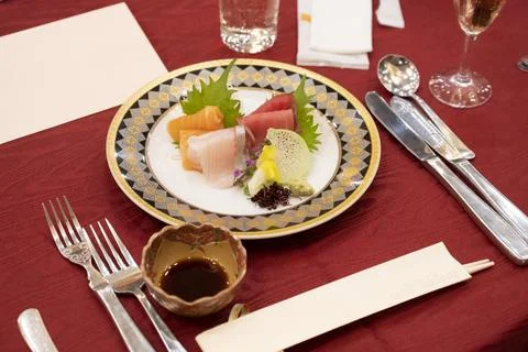 Sashimi table set and red tablecloth Stock Photos