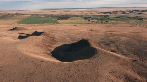Saskatchewan aerial of badlands and farm land Stock Footage