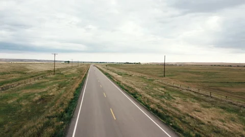 Saskatchewan flat highway in the prairies Stock Footage 168375832