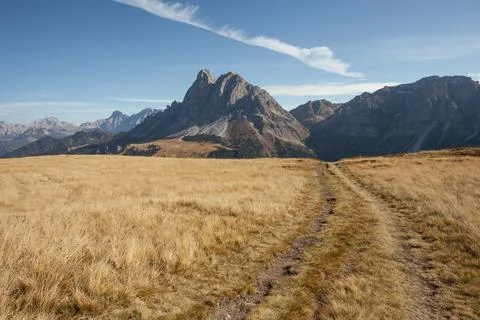 Sass de Putia mount over a pasture in Dolomites at evening Stock Photos