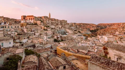 Sassi of Matera during summer sunset with tourists, Timelapse 4K Stock Footage 167479423
