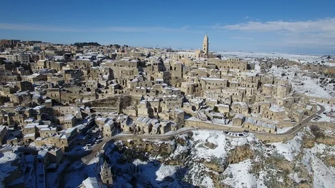 Sassi of Matera with snow drone flight Video stock 106069692