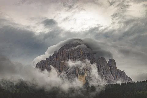 Sassolungo in the clouds Stock Photos