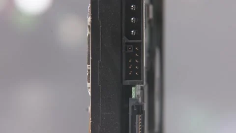 SATA disk drive to inside internal computer drives disc lens flare blur Stock Footage 329708314