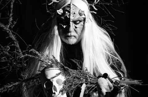 Satan on Hell. Bearded old man dressed like Halloween monster. Man evil with 스톡 사진
