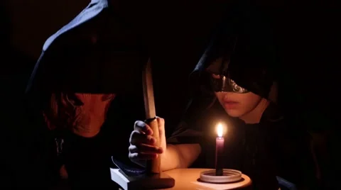 Satanic priests - pig and druid - performing dark ritual. 4K UHD Stockbeeldmateriaal 68079150