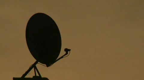 Satelite dish silhouette Stock Footage