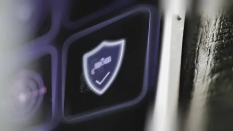 Satellite and check mark sit inside a bright security shield 動画素材 343377332