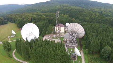 Satellite antennas  array and communications tower Stock Footage 54684867