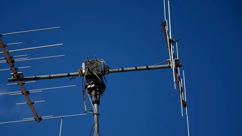 Satellite Array in north Italy, a satellite turns slowly towards the camera Stock Footage 90318586