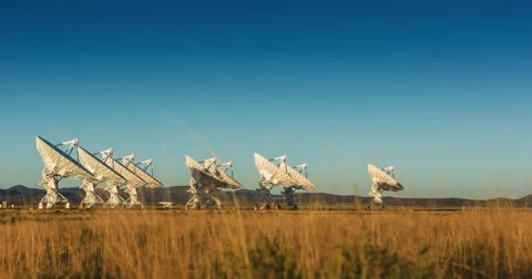 Satellite Array Timelapse at Sunset Stock Footage 57755086