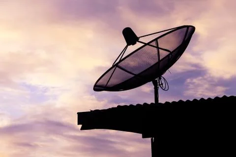 Satellite communication disk on evening background Stock Photos