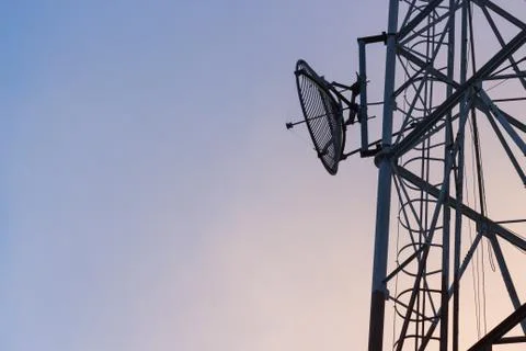 Satellite on communication tower Stock Photos